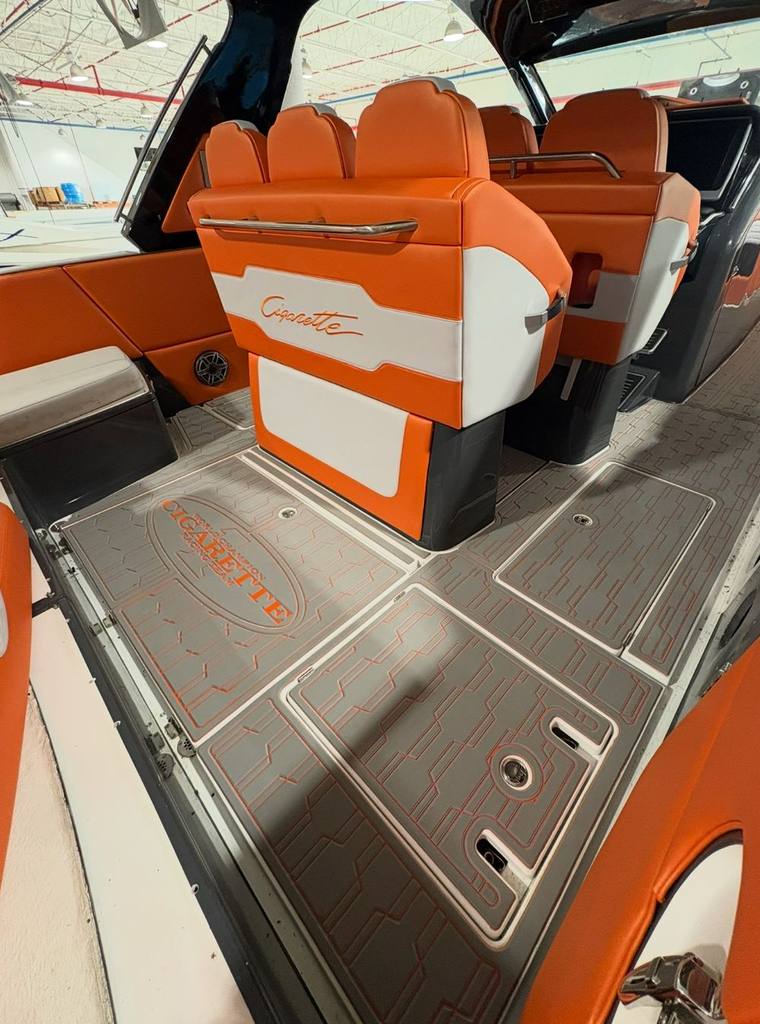 Cockpit after decking: storm gray with orange accent grooves and an inlaid logo